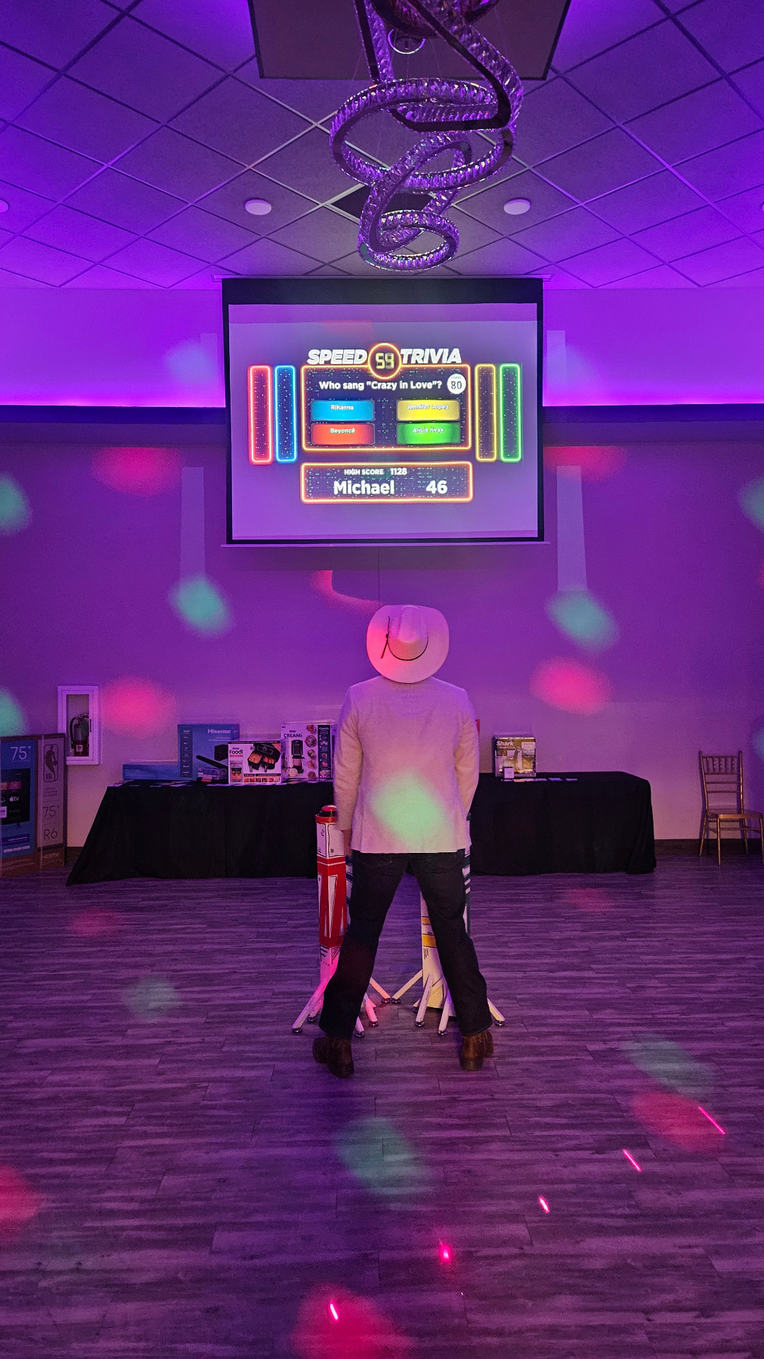 Interactive trivia game show with colorful lights at corporate event